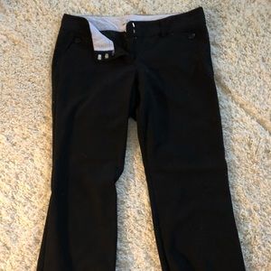 Gently used black dress pants.